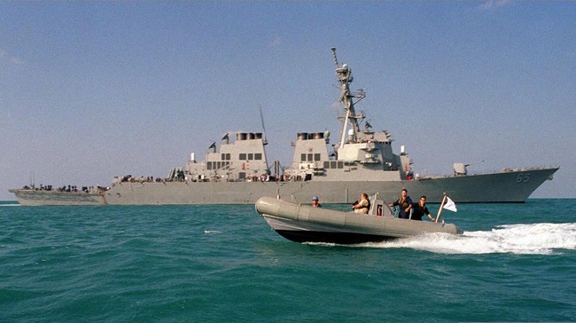 Kapal perang penghancur rudal Amerika Serikat menantang klaim China atas Laut China Selatan setelah diusir dari perairan tersebut.