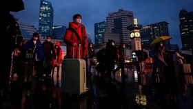 FOTO: Kelabu Mudik Imlek Warga China di Bawah Bayang Lockdown