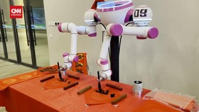 VIDEO: Robot Kaligrafi Ikut Rayakan Tahun Baru China