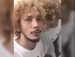 7 Penampilan Terbaru Norman Kamaru, Rambut Kribo Pirang & Tato Tengkorak