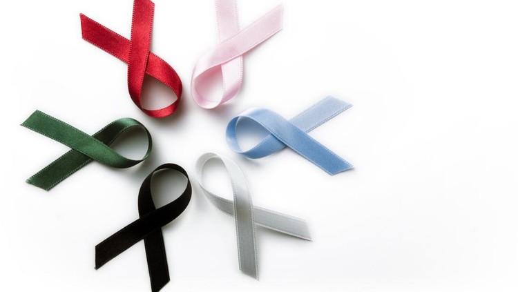 photo of different awareness satin ribbons isolated on white