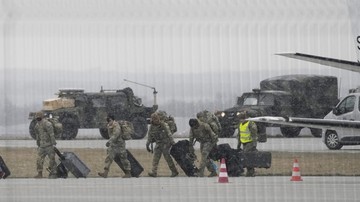 U.S. Army troops of the 82nd Airborne Division unloading vehicles from a transport plane after arriving from Fort Bragg at the Rzeszow-Jasionka airport in southeastern Poland, on Sunday, Feb. 6, 2022. Additional U.S. troops are arriving in Poland after President Joe Biden ordered the deployment of 1,700 soldiers here amid fears of a Russian invasion of Ukraine. Some 4,000 U.S. troops have been stationed in Poland since 2017. (AP Photo/Czarek Sokolowski)