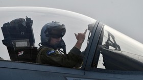 Pilot of US F-15 fighter reacts after landing during an air force exercise at Starokostyantyniv military airbase on October 12, 2018. - The large-scale air force exercises with the United States and other NATO countries "Clear Sky 2018", which will r