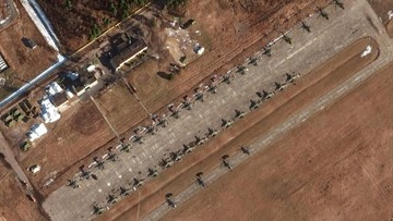 In this Friday, Feb. 18, 2022 satellite imagery provided by Maxar Technologies Su-25 ground attack aircraft (total of 32), helicopters, an S-400 air defense unit, ground force equipment and a UAV/drone unit are seen at Luninets airfield  approximately 50 kilometers north of the border with Ukraine. (Maxar Technologies via AP)