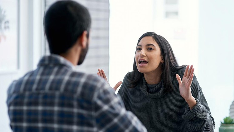 Shot of a young couple having an argument at home