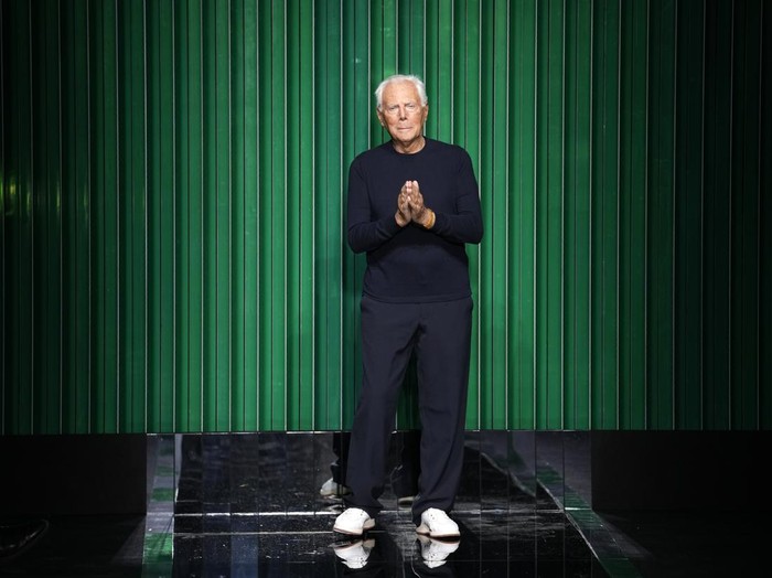 Italian designer Giorgio Armani accepts applause after presentation of his Fall/Winter 2022-2023 fashion collection, unveiled during the Fashion Week in Milan, Italy, Sunday, Feb. 27, 2022. (AP Photo/Luca Bruno)