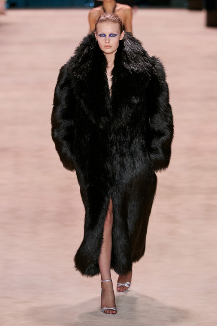 A faux fur coat or synthetic fur is the focal point in this collection.  The silhouette even comes in oversized.  Photo: Alessandro Lucioni/Go Runway/Vogue