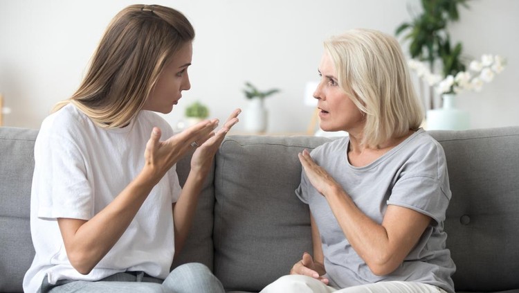 Angry young woman has disagreement with annoyed old mother in law, grown daughter arguing fighting quarreling with senior elderly mom, different age generations bad relations family conflict concept