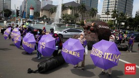 FOTO: Perempuan Tolak Kekerasan Seksual dan Kemiskinan