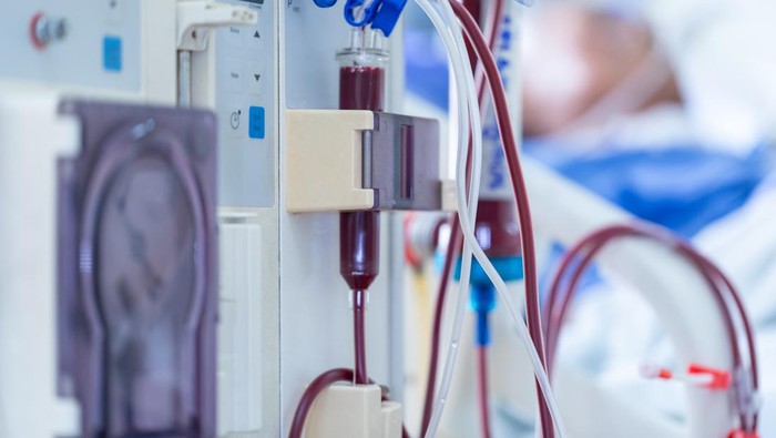 Dialysis machine is working. Acting as a substitute for the kidneys to drive waste from the body.