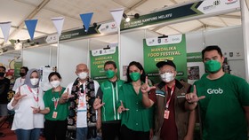 Grab dan KemenkopUKM Dukung UMKM Kuliner Mendunia di Sirkuit Mandalika