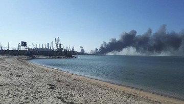 Russia Ukraine War Smoke rises after shelling near a seaport in Berdyansk, Ukraine, Thursday, March 24, 2022. Ukraine's navy reported Thursday that it had sunk the Russian ship Orsk in the Sea of Asov near the port city of Berdyansk. It released photos and video of fire and thick smoke coming from the port area. Russia did not immediately comment on the claim. (AP Photo)