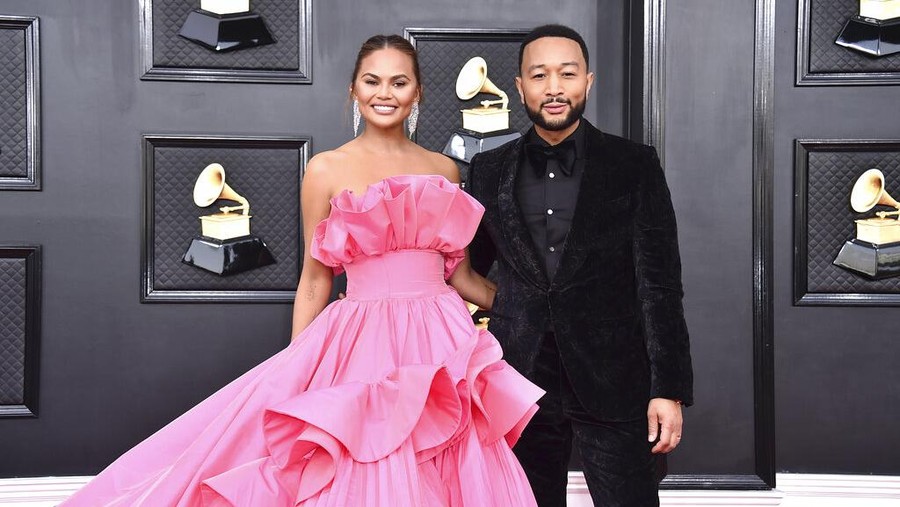 Chrissy Teigen arrives at the 64th Annual Grammy Awards at the MGM Grand Garden Arena on Sunday, April 3, 2022, in Las Vegas. (Photo by Jordan Strauss/Invision/AP)