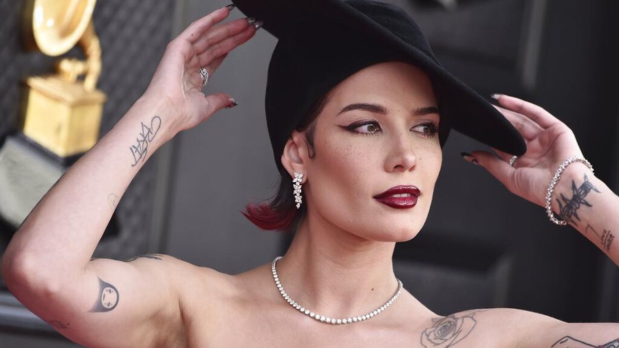 Halsey arrives at the 64th Annual Grammy Awards at the MGM Grand Garden Arena on Sunday, April 3, 2022, in Las Vegas. (Photo by Jordan Strauss/Invision/AP)