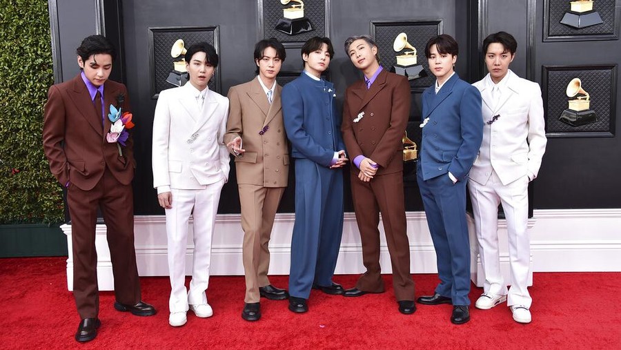 BTS arrives at the 64th Annual Grammy Awards at the MGM Grand Garden Arena on Sunday, April 3, 2022, in Las Vegas. (Photo by Jordan Strauss/Invision/AP)