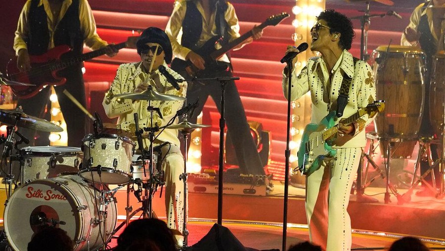 Anderson Paak, left, and Bruno Mars of Silk Sonic perform at the 64th Annual Grammy Awards on Sunday, April 3, 2022, in Las Vegas. (AP Photo/Chris Pizzello)