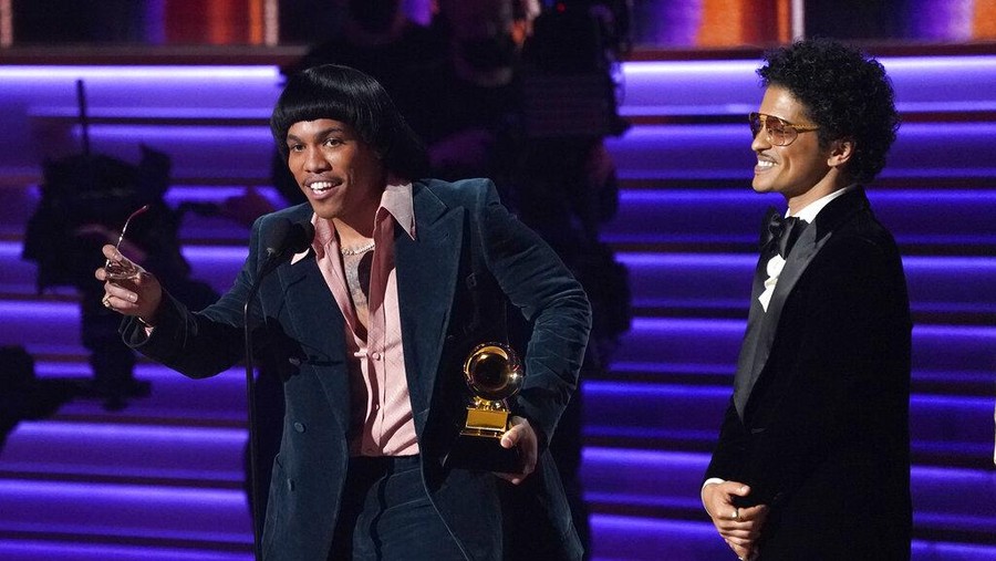 Anderson .Paak, left, and Bruno Mars of Silk Sonic accept the award for record of the year for 