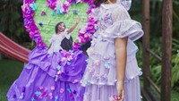 <p>Anak pertama Happy Salma dengan Tjokorda Bagus Dwi Santana Max Kerthyasa, tampil cantik menggunakan gaun berwarna ungu. (Foto: Instagram @happysalma)</p>