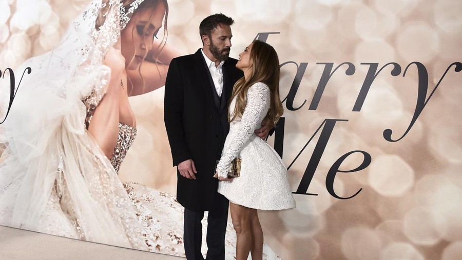 FILE - Cast member Jennifer Lopez, right, and Ben Affleck attend a photo call for a special screening of 