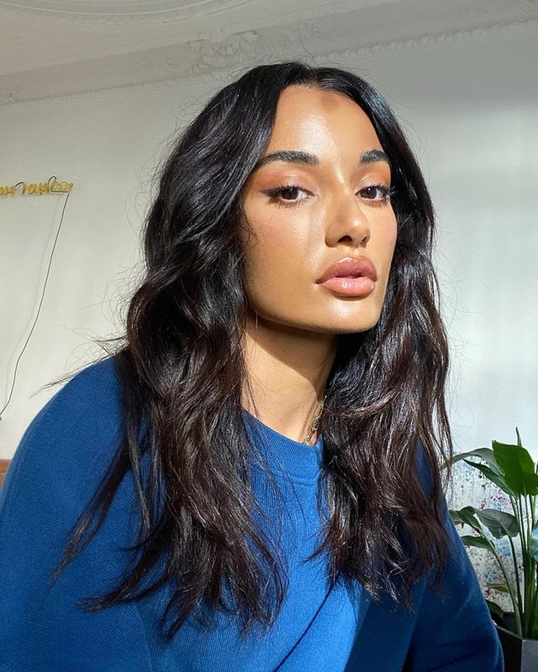 Amina Muaddi Potret Amina Muaddi yang disebut jadi orang ketiga di hubungan Rihannad dan ASAP Rocky