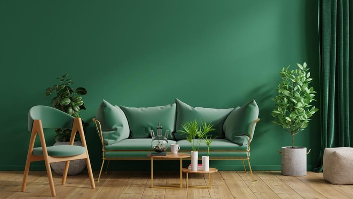 Interior mockup green wall with green sofa and green armchair in living room,3D rendering