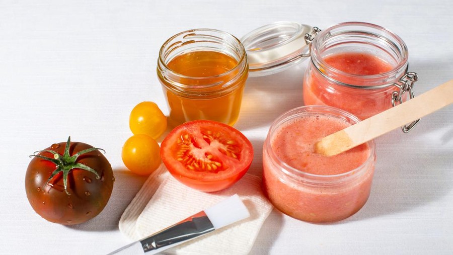 Tomatoes pulp and honey for facial mask. Organic home made cosmetic. Natural DIY skin care product.
