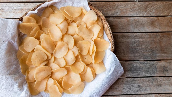 Traditional dried raw prawn shrimp cracker on tray ready for frying