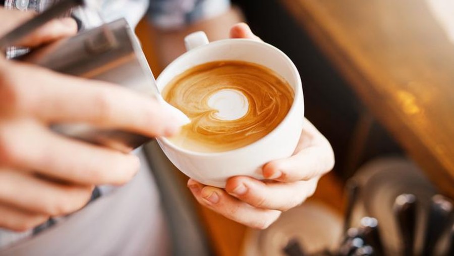 Coffee with cookies and astrological zodiac symbols