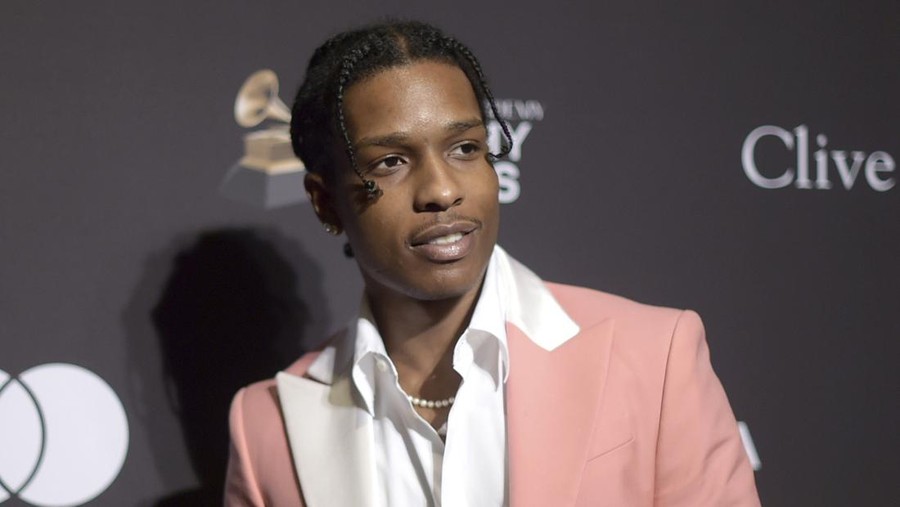 FILE - A$AP Rocky attends the Pre-Grammy Gala And Salute To Industry Icons on Feb. 9, 2019 in Beverly Hills, Calif.   A$AP Rocky was taken into custody Wednesday, April 20, 2022 at Los Angeles International Airport in connection with a shooting in Hollywood last year, authorities said. The performer, whose real name is Rakim Mayers, was detained on suspicion of assault with a deadly weapon, the Los Angeles Police Department said in a statement Wednesday.(Photo by Richard Shotwell/Invision/AP, File)