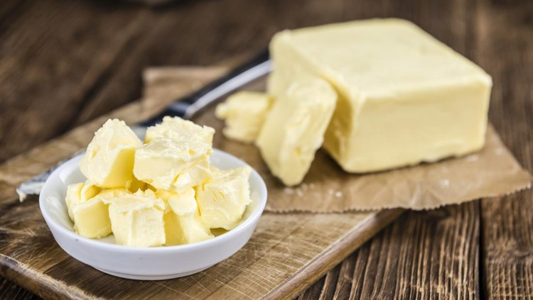 Piece of Butter (selective focus, detailed close-up shot)