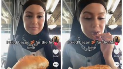 Nekat Makan Daging Babi, Wanita Berhijab Ini Ramai Kena Hujatan