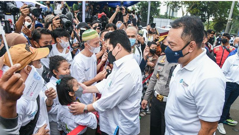 Kementerian BUMN memberangkatkan rombongan mudik gratis Lebaran 2022 dengan tema 'Mudik Aman Mudik Sehat Bersama BUMN 2022'