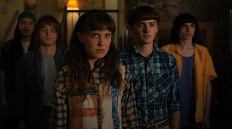 STRANGER THINGS. (L to R) Eduardo Franco as Argyle, Charlie Heaton as Jonathan, Millie Bobby Brown as Eleven, Noah Schnapp as Will Byers, and Finn Wolfhard as Mike Wheeler in STRANGER THINGS. Cr. Courtesy of Netflix  © 2022