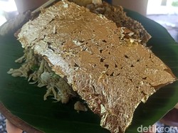 Babi Panggang Berlapis Lembaran Emas 23 Karat