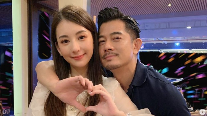 Aaron Kwok dan istrinya.