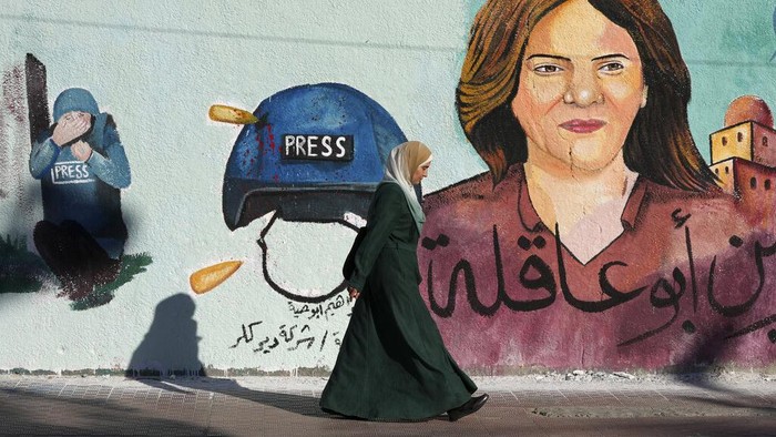 A mural of slain of Al Jazeera journalist Shireen Abu Akleh is on display, in Gaza City, Sunday, May 15, 2022. Abu Akleh was shot and killed while covering an Israeli raid in the occupied West Bank town of Jenin on May 11, 2022. (AP Photo/Adel Hana)