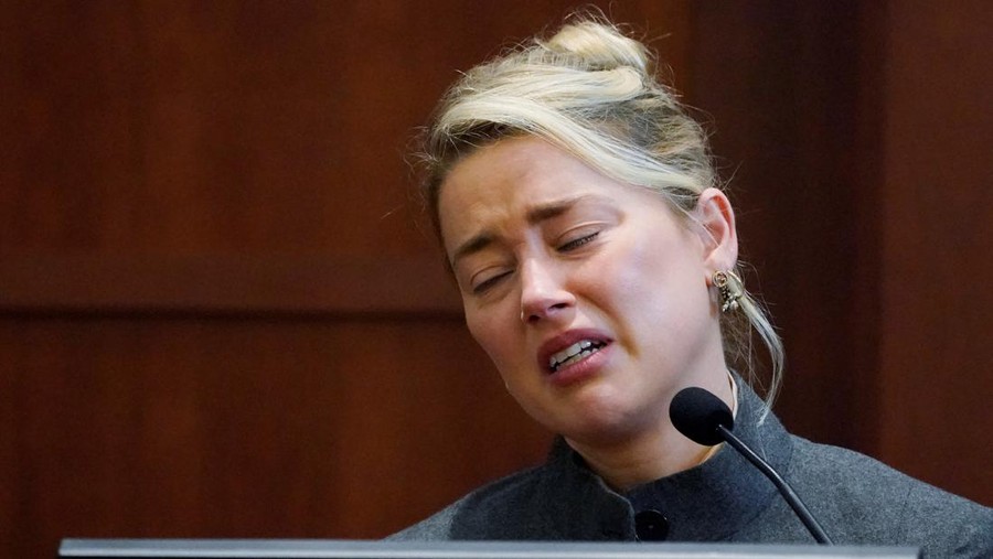 Amber Heard Actor Amber Heard testifies in the courtroom at the Fairfax County Circuit Courthouse in Fairfax, Va., Monday, May 16, 2022. Steve Helber/Pool via REUTERS