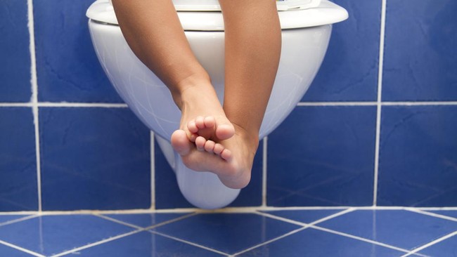 Ilustrasi anak di toilet