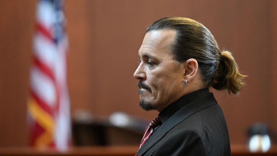 US actor Johnny Depp looks on during a hearing at the Fairfax County Circuit Courthouse in Fairfax, Virginia, on May 3, 2022. - US actor Johnny Depp sued his ex-wife Amber Heard for libel in Fairfax County Circuit Court after she wrote an op-ed piece in The Washington Post in 2018 referring to herself as a 
