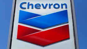 FILE PHOTO: FILE PHOTO: A Chevron gas station sign is seen in Del Mar, California, April 25, 2013. REUTERS/Mike Blake/File Photo/File Photo