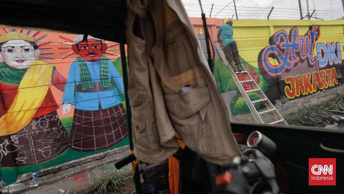 FOTO: Hajatan, 495 Mural Hiasi Tembok Jalan di Utara Jakarta
