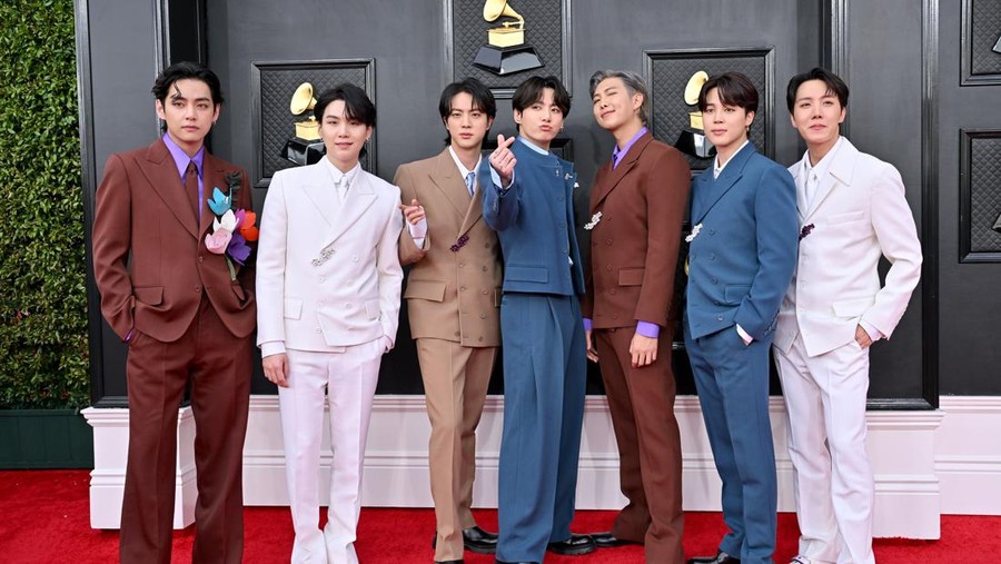 LAS VEGAS, NEVADA - APRIL 03: (L-R) V, Suga, Jin, Jungkook, RM, Jimin and J-Hope of BTS attends the 64th Annual GRAMMY Awards at MGM Grand Garden Arena on April 03, 2022 in Las Vegas, Nevada. (Photo by Axelle/Bauer-Griffin/FilmMagic)
