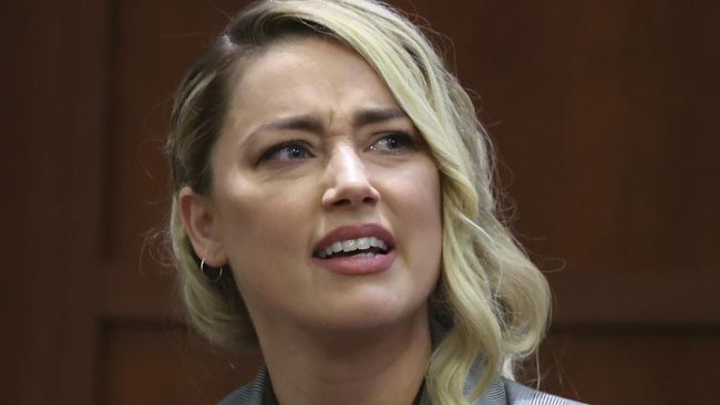 Amber Heard mengaku tidak mengetahui kehadiran paparazi di luar gedung pengadilan saat ia mengajukan TRO terhadap Johnny Depp.