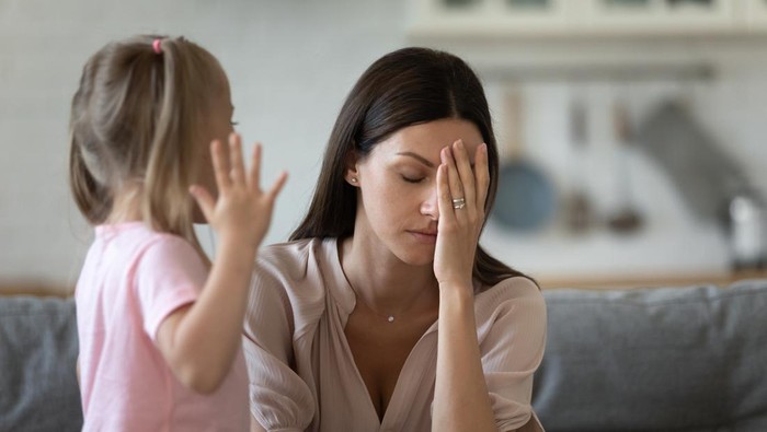 Tired single mother feel stressed desperate about screaming stubborn kid daughter tantrum, frustrated depressed young adult mom annoyed by naughty difficult rebellious child girl problems concept