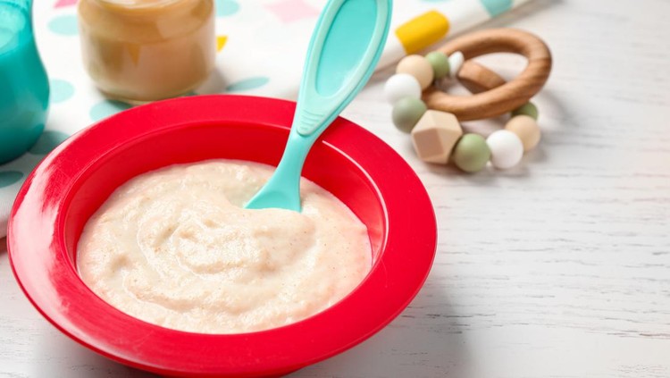 Healthy baby food on white wooden table, closeup