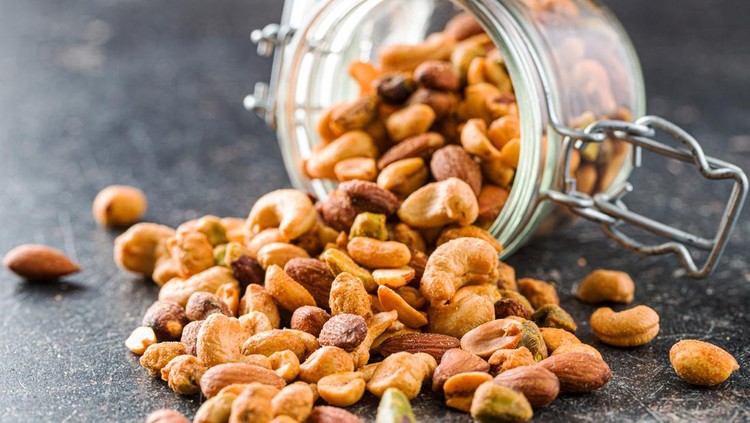 Ilustrasi Kacang Telur Spicy flavoured nuts. Mix of nuts in jar.