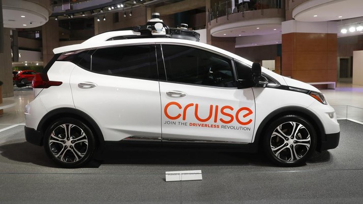 FILE - In this Jan. 16, 2019, file photo, Cruise AV, General Motor's autonomous electric Bolt EV is displayed in Detroit. General Motors' self-driving car company is sending vehicles without anybody behind the wheel in San Francisco as it navigates its way toward launching a robotic taxi service that would compete against Uber and Lyft in the hometown of the leading ride-hailing services. The move announced Wednesday, Dec. 9, 2020, by GM-owned Cruise come two months after the company received California’s permission to fully driverless cars in the state.  (AP Photo/Paul Sancya, File)