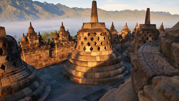 Famous Buddhist Temple Borobudur at Sunrise. Yogyakarta, Island Java - Indonesia