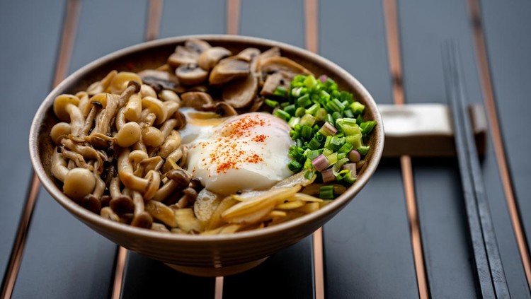 Healthy Vegetarian Don. Japanese rice served with fried onions, button mushrooms, champignon mushrooms, spring onions, clamshell mushrooms with onsen egg.