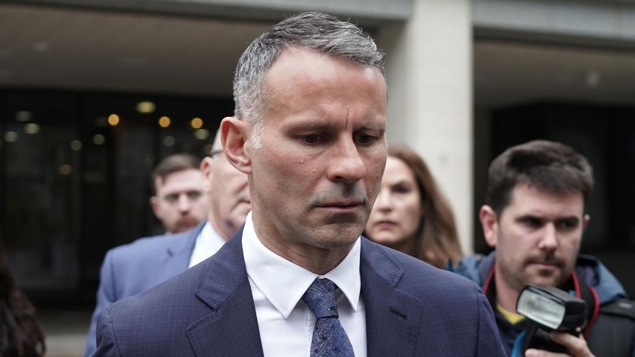 MANCHESTER, ENGLAND - MAY 28: Ryan Giggs leaves Manchester Crown Court after appearing for a plea and trial preparation hearing on May 28, 2021 in Manchester, England. The former Manchester United midfielder, who is currently the manager of Wales' men's international football team, is accused of causing actual bodily harm to a woman in her 30s, common assault to a woman in her 20s and of coercive and controlling behaviour. He denies the charges. (Photo by Christopher Furlong/Getty Images)